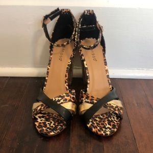 Bamboo animal print buckle strap heels. Gold detail.